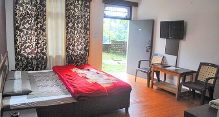 Dharamkot Inn Room Type - Deluxe Room