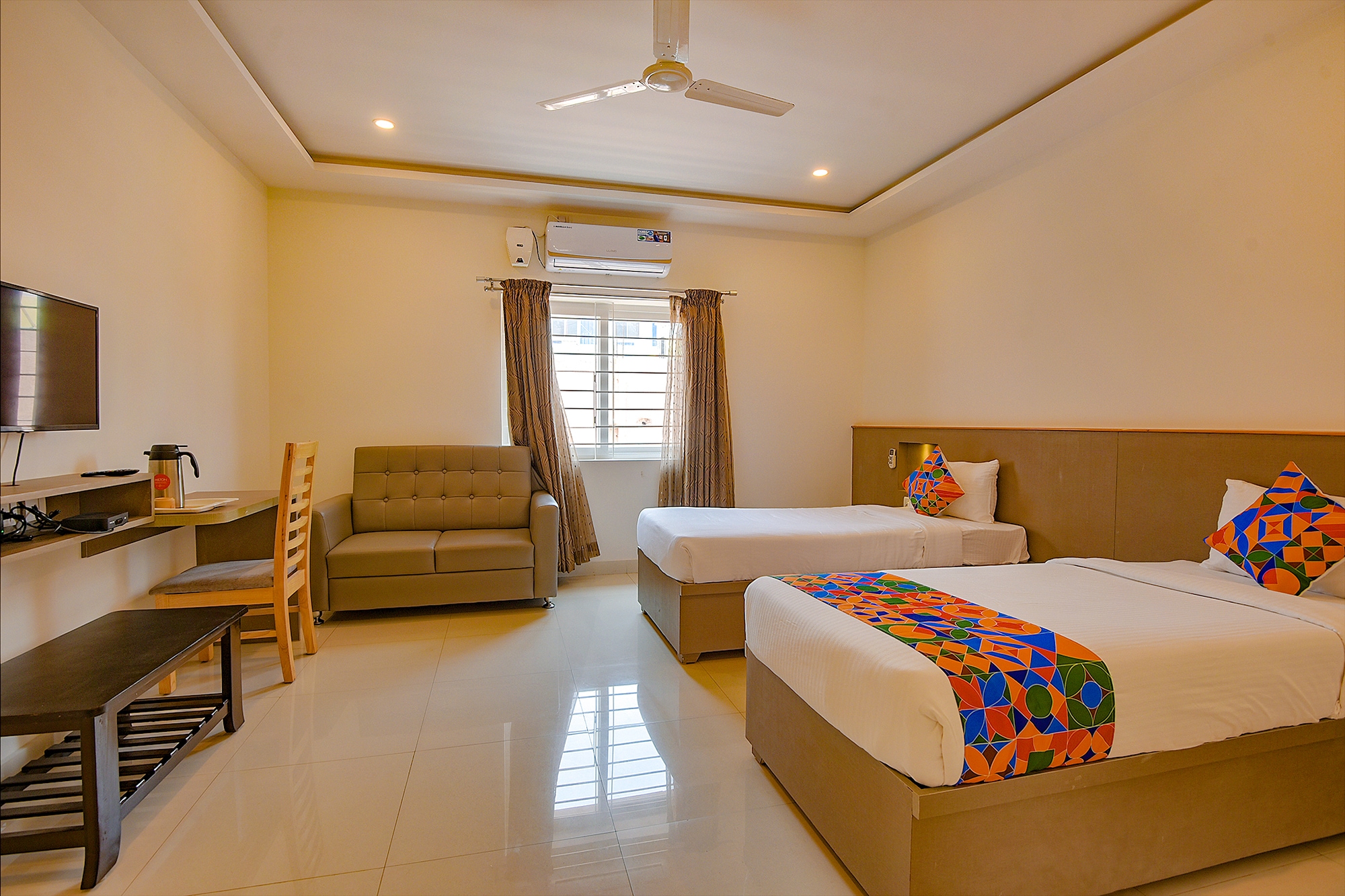 FabHotel Champion Gateway - Yelahanka - Tap to explore photos