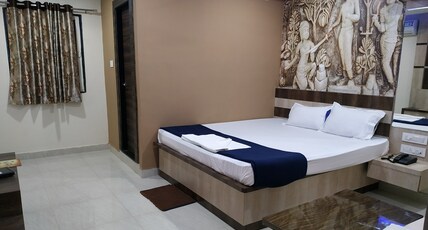 NIKKI'S RESIDENCY Room Type - DELUXE ROOM AC