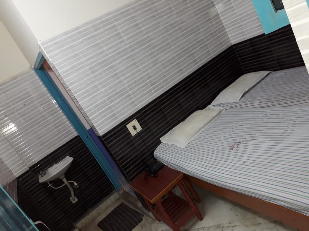 Sri Naarayana Guest Rooms - Tap to explore photos