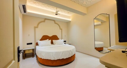 Hotel Nova Bloom Room Type - Exclusive Half Round Bed Suite with 43 Inch Smart Android T.V. for Youtube