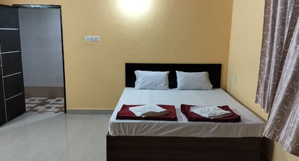 kamaths holiday inn Room Type - Deluxe King Bed Room AC