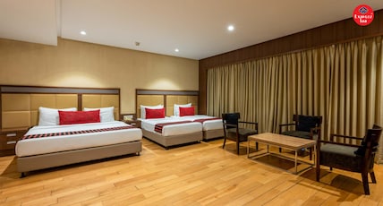 Express Inn The Business Luxury Hotel Room Type - Family Room (Spacious Room, 4 Single Beds, 2 Washrooms) Express Inn The Business Luxury Hotel Room Type - Family Room (Spacious Room, 4 Single Beds, 2 Washrooms)
