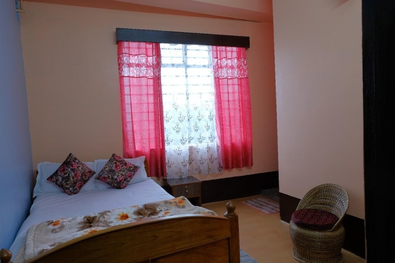 Down Town Homestay - Tap to explore photos