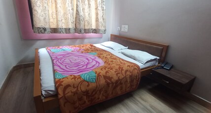 Hotel Pooja Residency Room Type - Deluxe Non AC Room