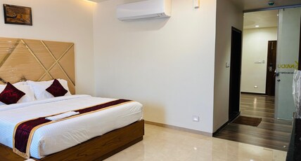 Mk naidu hotel and conventions center Room Type - Queen suite
