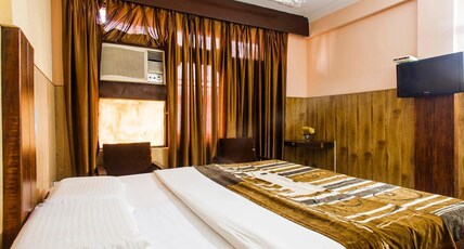 Hotel Sachin International Room Type - Deluxe AC Room