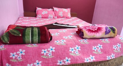 Sinjan Residency Room Type - NON AC DOUBLE BED DELUXE