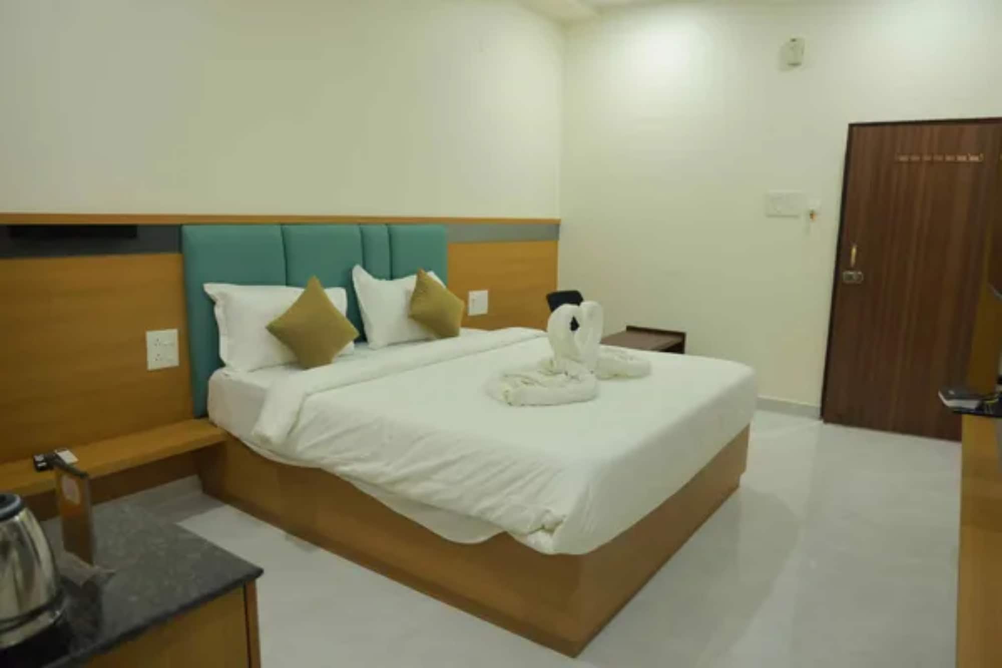 FabHotel Swagath Grand - Tap to explore photos