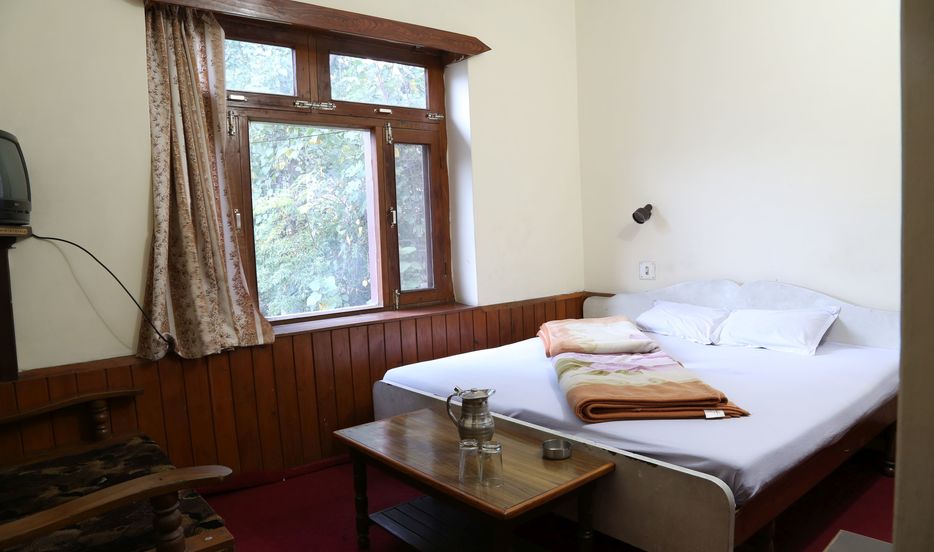 River Site Guest House - Tap to explore photos
