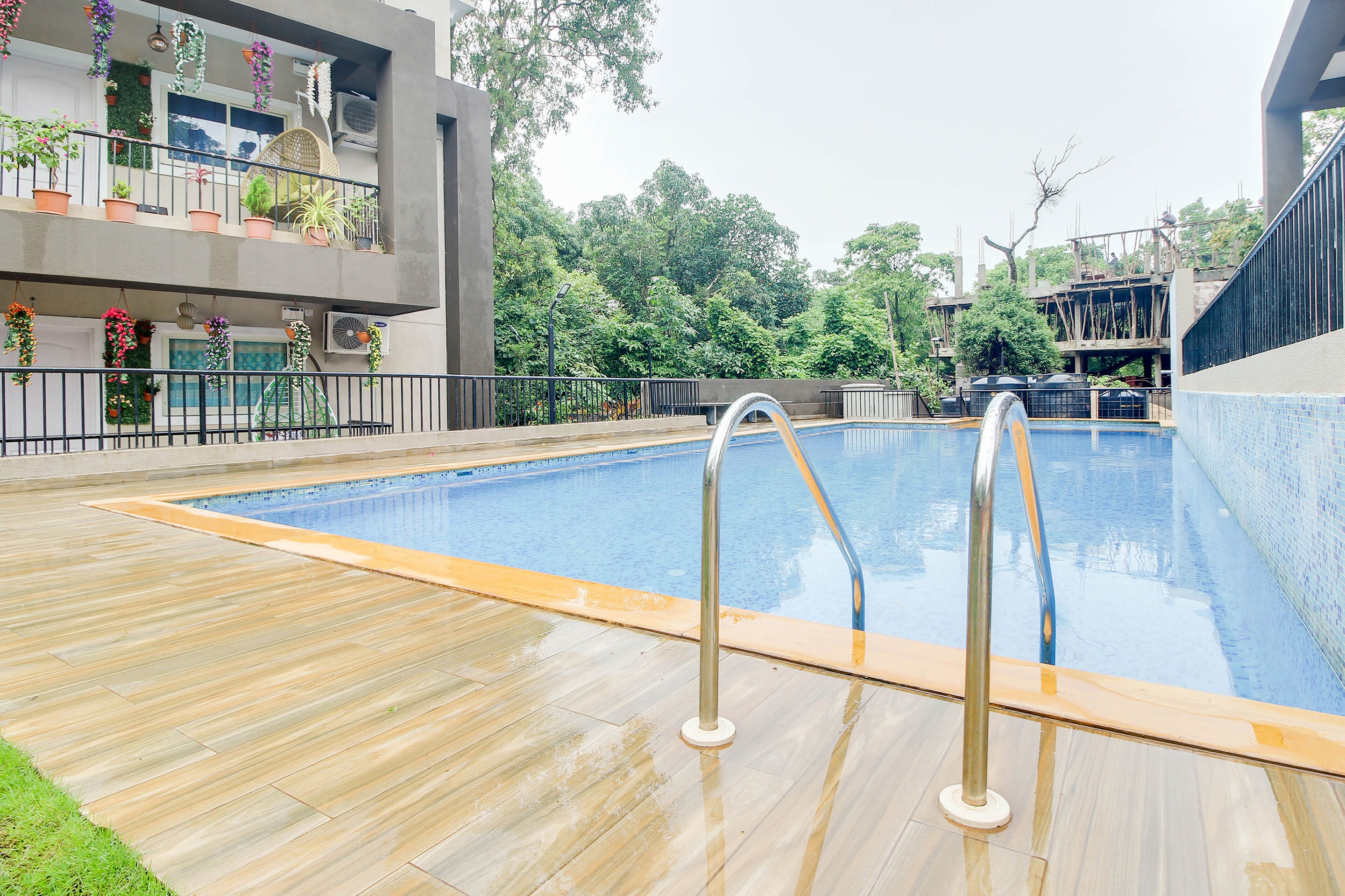 Modern 2BHK With Pool - Tap to explore photos