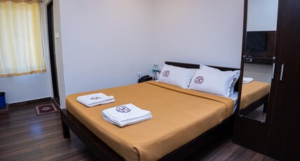 Mookambika Comforts Room Type - Standard Double AC