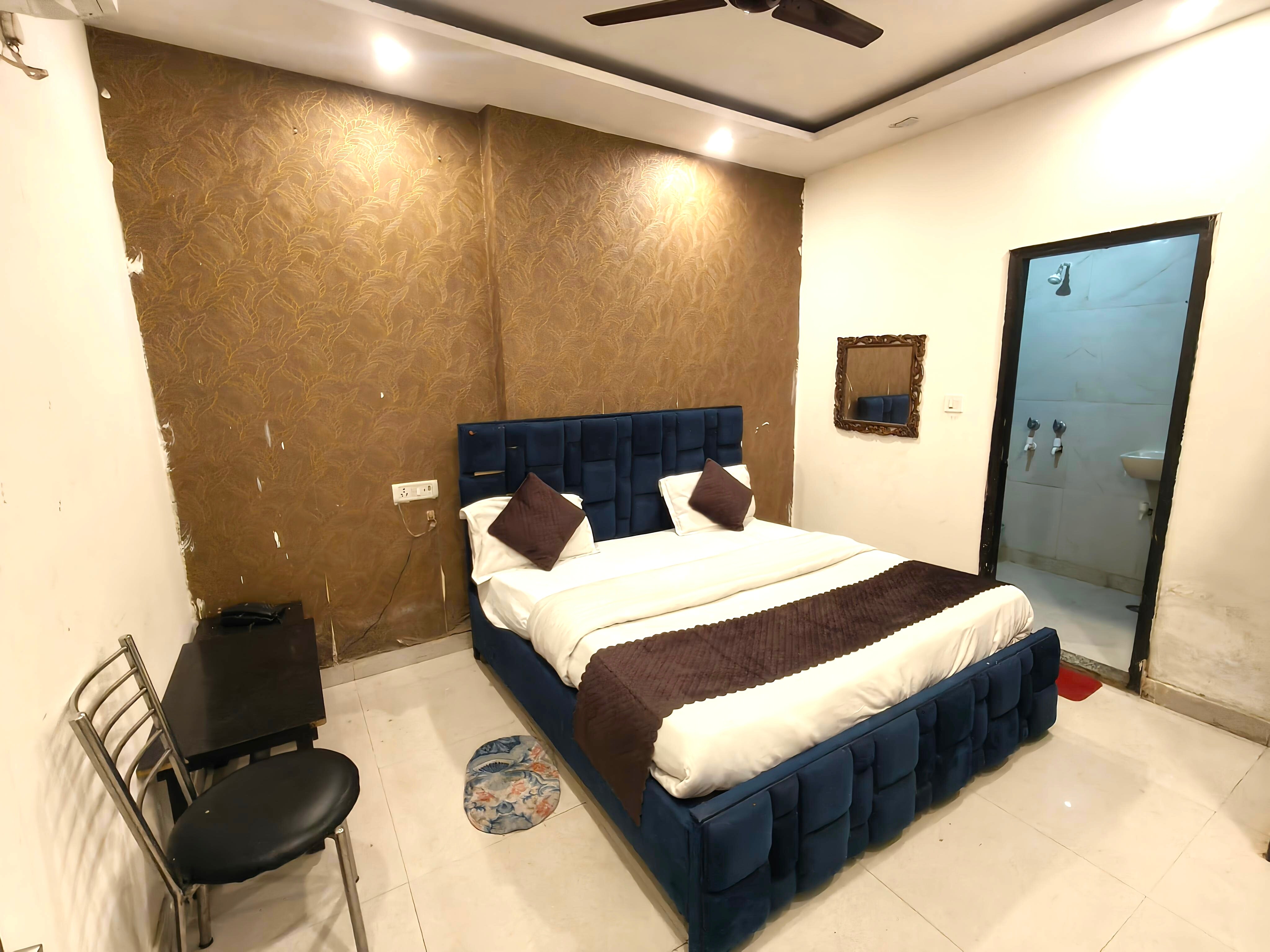 Hotel Du Rooms by Green Snapper Near Kamla Nagar - Tap to explore photos