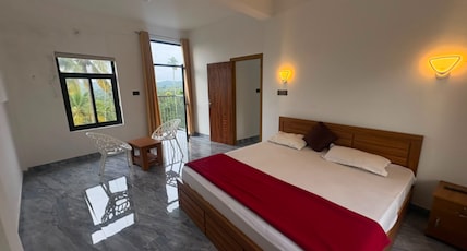 POOZHIKUTH RESIDENCY Room Type - Deluxe Double Room POOZHIKUTH RESIDENCY Room Type - Deluxe Double Room