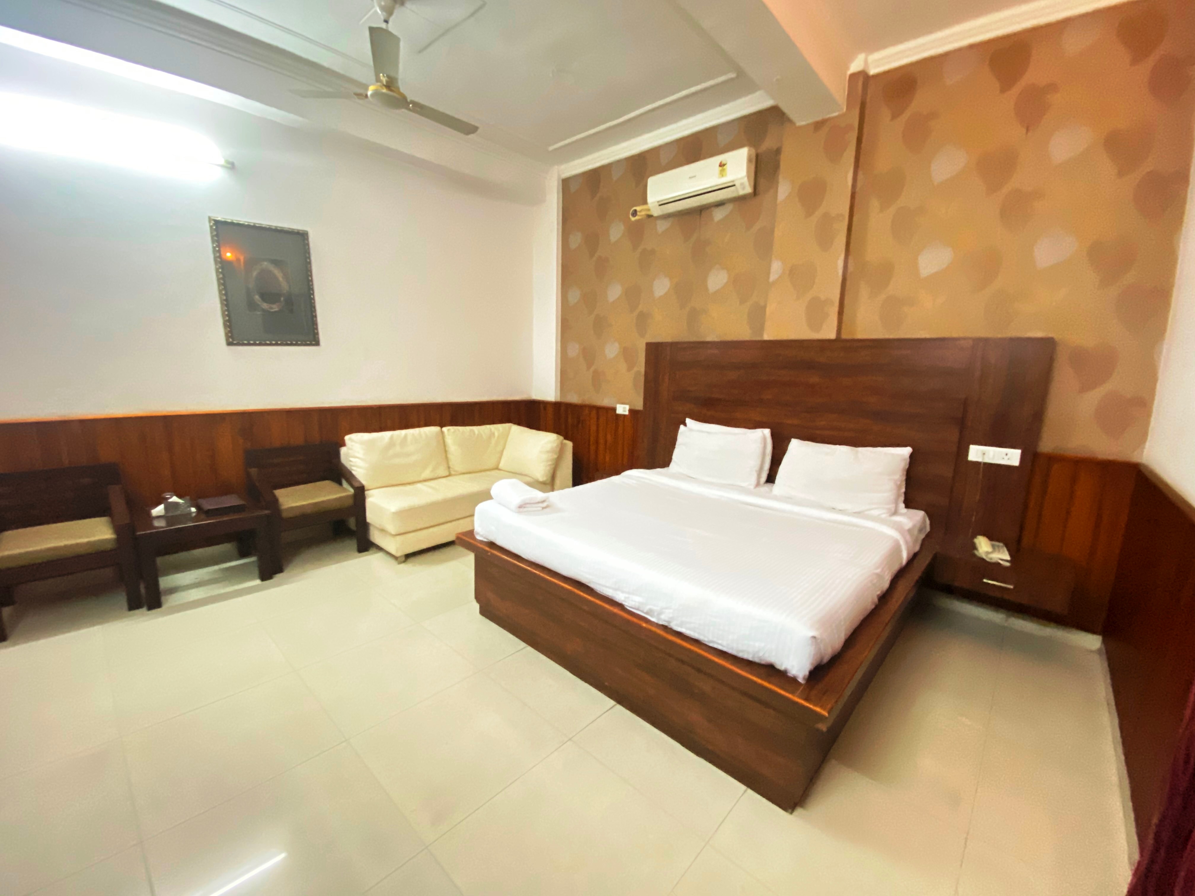 Red Apple Hotel  - Tap to explore photos