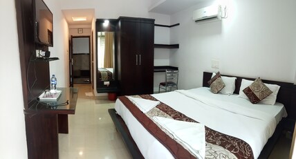 SAI INTERNATIONAL Room Type - DELUXE AC double bed room