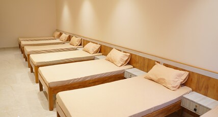 SATVI INN Room Type - Dorm with 7 number single beds non airconditioned SATVI INN Room Type - Dorm with 7 number single beds non airconditioned