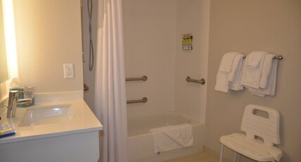 Holiday Inn Express Hotel & Suites Rochester Room Type - 1 King Suite Communications Mobility Accessible Tub Holiday Inn Express Hotel & Suites Rochester Room Type - 1 King Suite Communications Mobility Accessible Tub