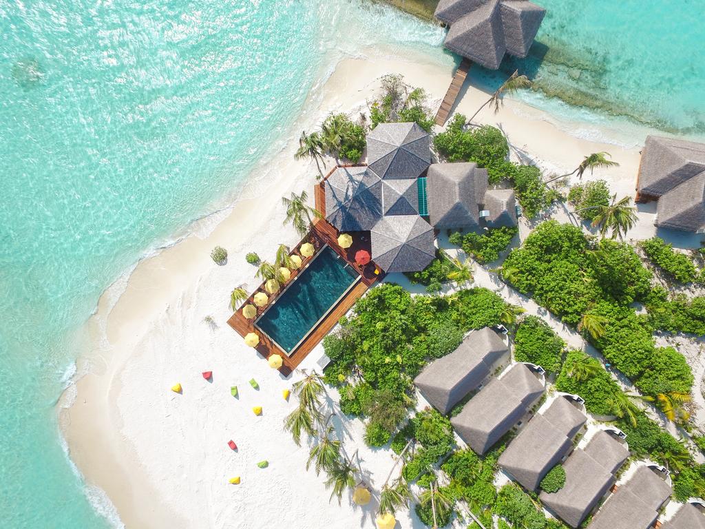 Dhigufaru Island Resort - Tap to explore photos