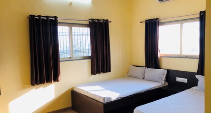 Shrinivas Residency A/c Lodging Room Type - Deluxe Room