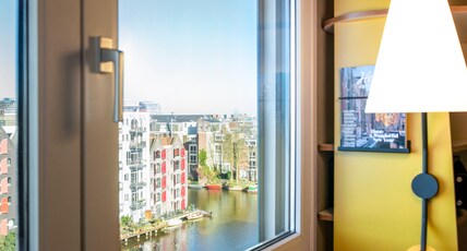 IBIS AMSTERDAM CENTRE STOPERA Room Type - Room with Double Bed and view of a typical Amsterdam Canal IBIS AMSTERDAM CENTRE STOPERA Room Type - Room with Double Bed and view of a typical Amsterdam Canal