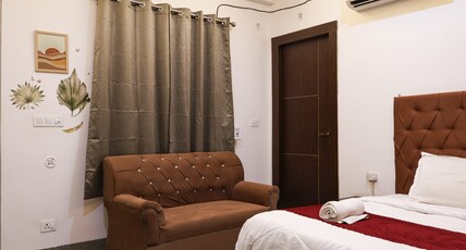 Amara Inn by Sandane Homes Room Type - Deluxe room