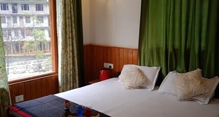 Tirthan mid point Room Type - Mountain view room 2