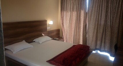 Maruti inn Room Type - Semi deluxe AC