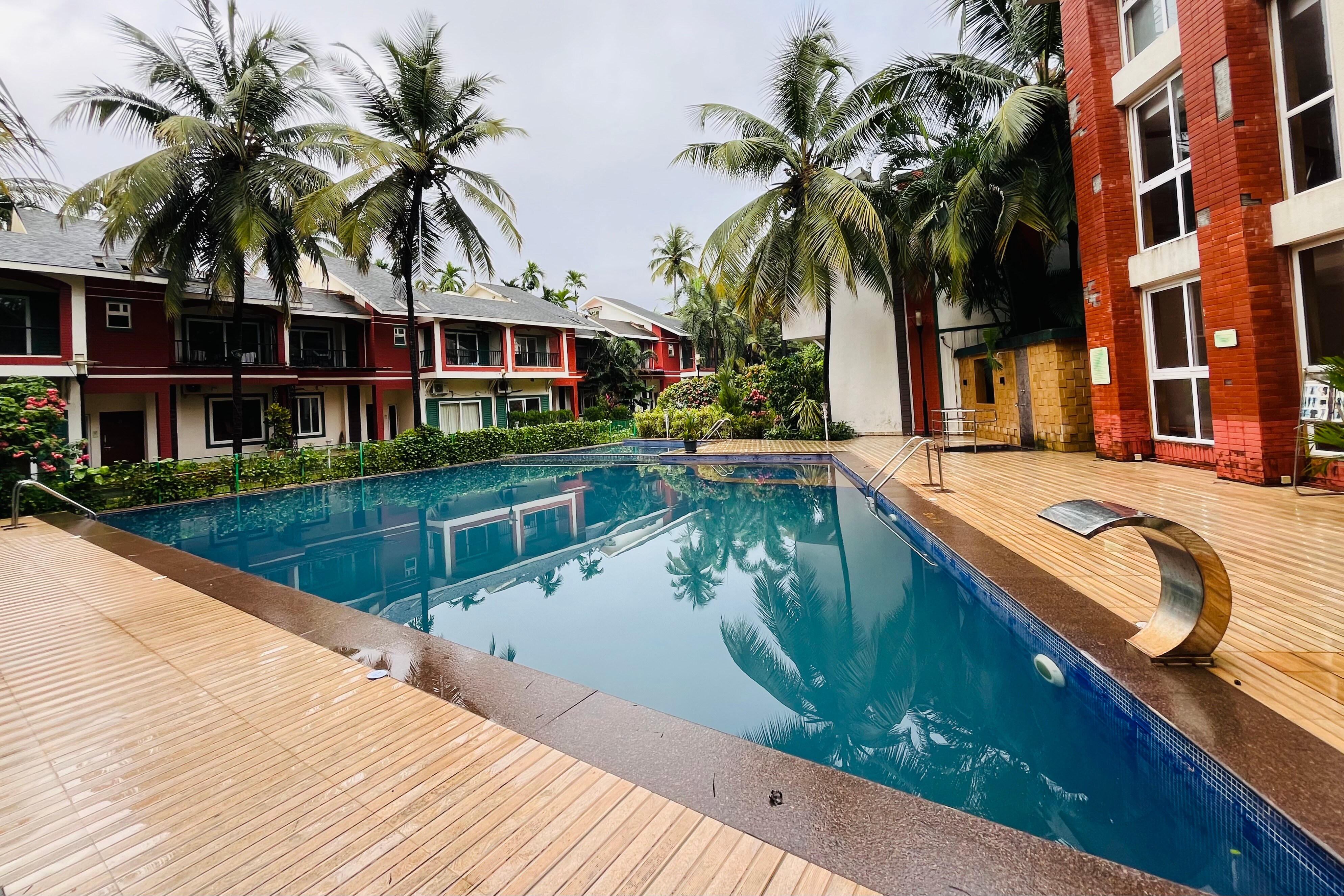 Luxury 1BHK - TheMagicDoor | Pool View | Parking | Wifi - Tap to explore photos