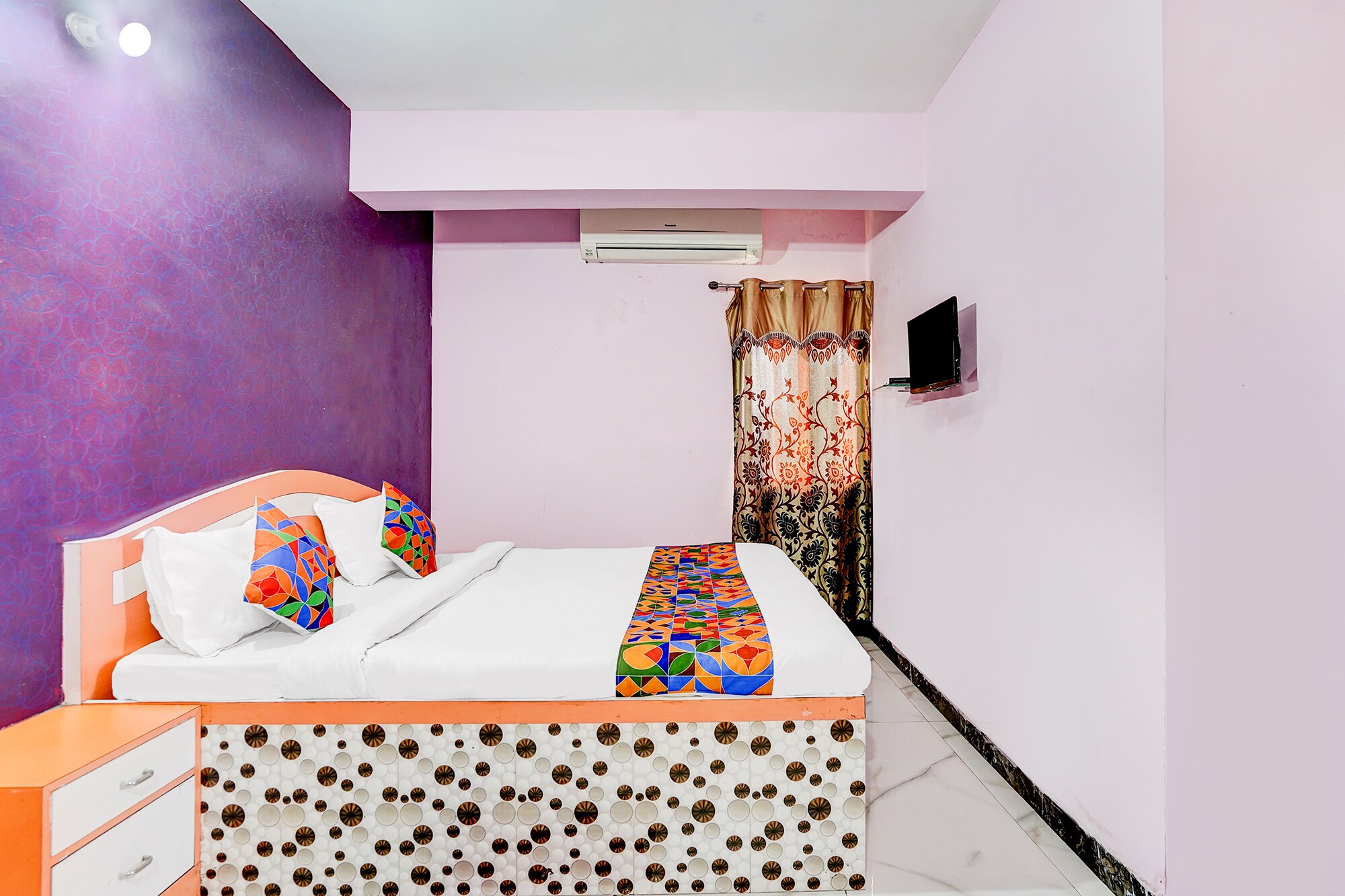 FabHotel Triotel Inn - Tap to explore photos