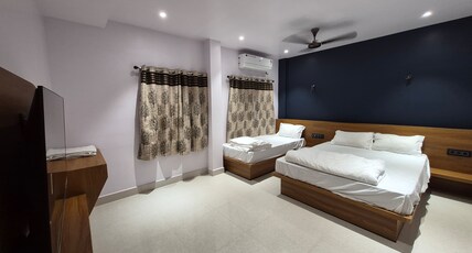 HOTEL STAY INN Room Type - DELUXE TRIPLE ROOM (AC)