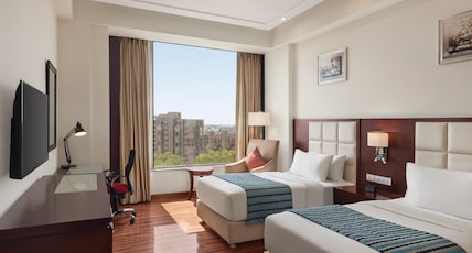 Ramada by Wyndham New Delhi Pitampura Room Type - Deluxe Twin, Mobility Accessible Room, Non-Smoking Ramada by Wyndham New Delhi Pitampura Room Type - Deluxe Twin, Mobility Accessible Room, Non-Smoking