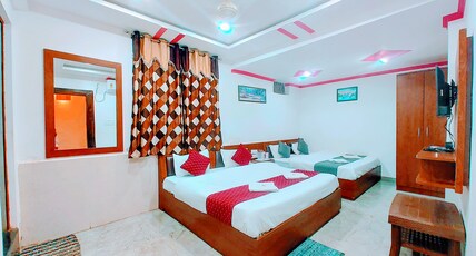 Hotel Sphatic- 5 Mins from KamtaNath Temple. Room Type - Deluxe Four Bed Room