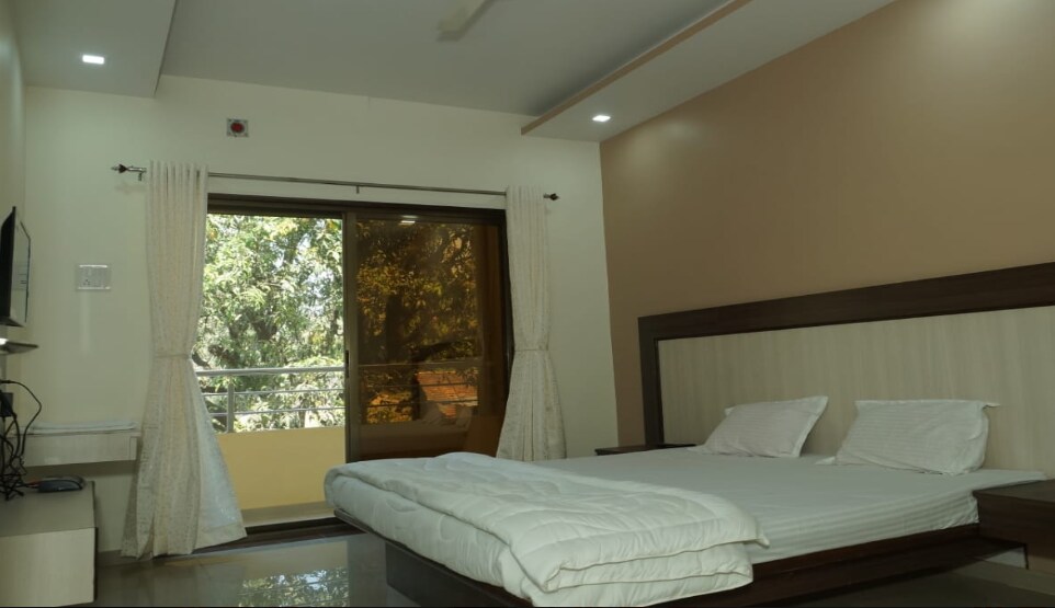 Hotel Draupadi Inn - Tap to explore photos