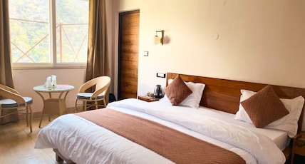 Daandikaanthi Hotel (100 Metre Walking From Maa Dhari Devi Temple Gate) Room Type - River View Deluxe Room ( Ground floor, Shared Outdoor Space ) Daandikaanthi Hotel (100 Metre Walking From Maa Dhari Devi Temple Gate) Room Type - River View Deluxe Room ( Ground floor, Shared Outdoor Space )