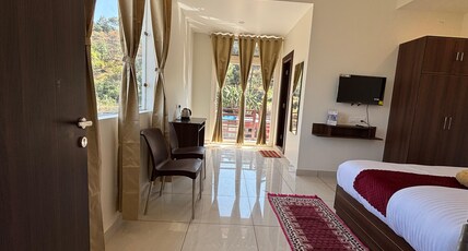 Hotel Rewalsar Heights Room Type - Deluxe Room