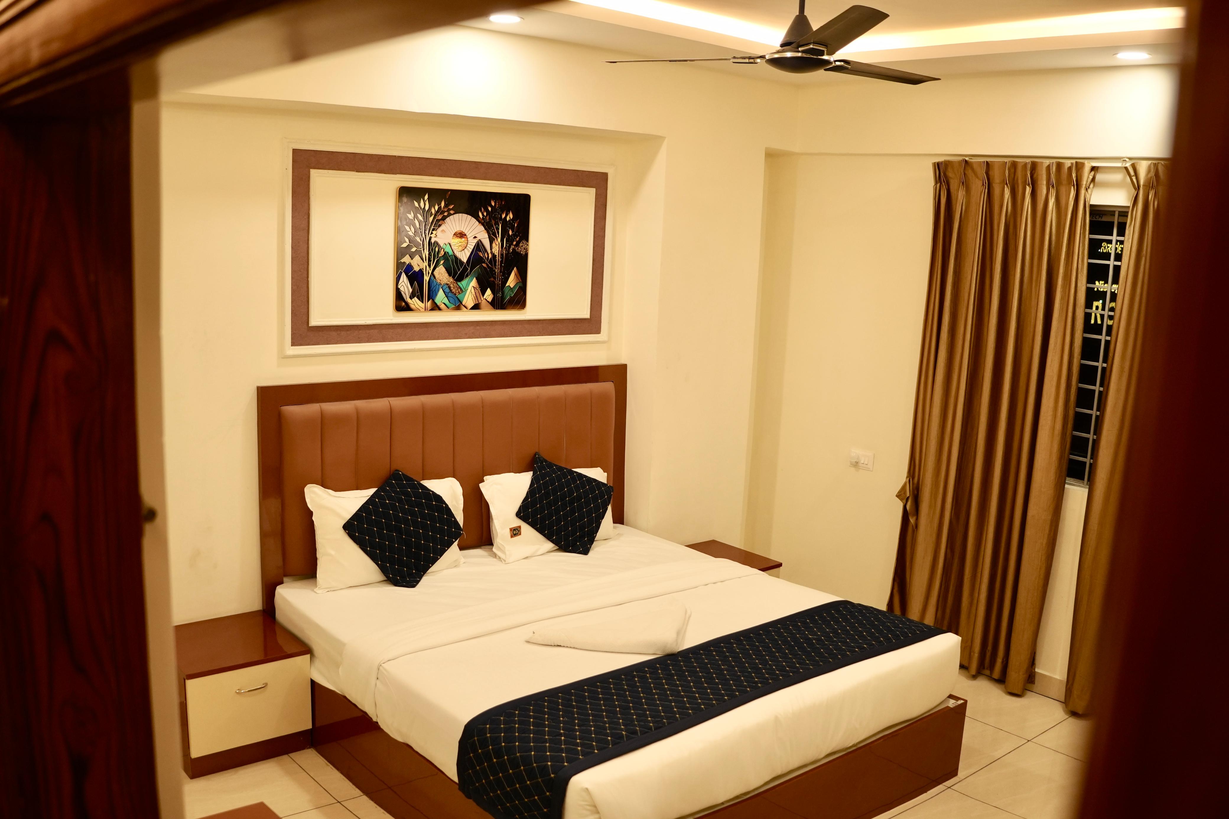 FIODA ROYAL ROOMS KR PURAM - Tap to explore photos