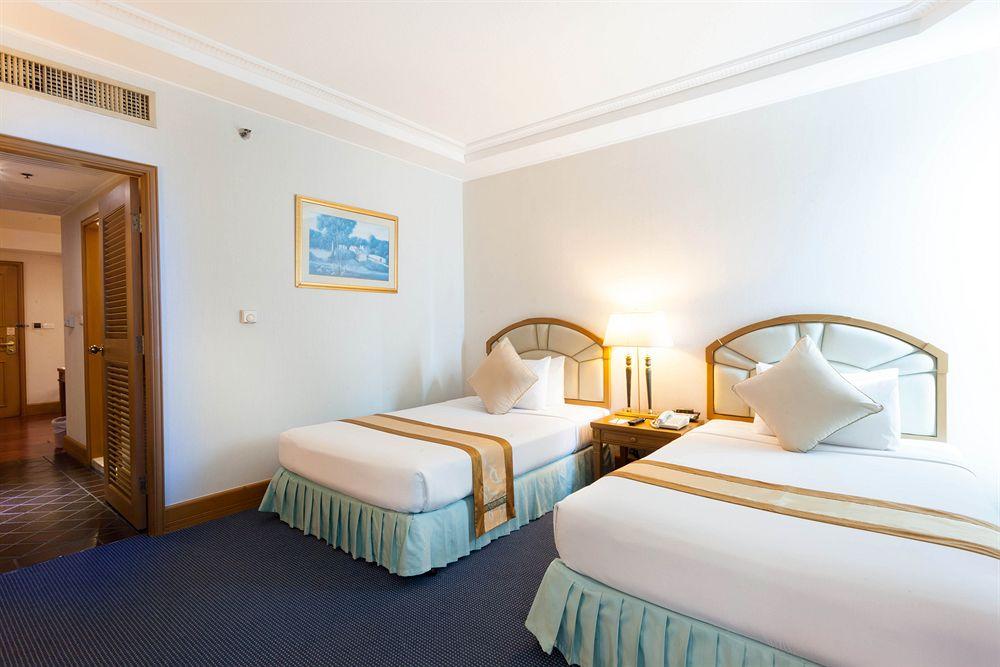 Windsor Suites Bangkok, Managed by Accor - Tap to explore photos