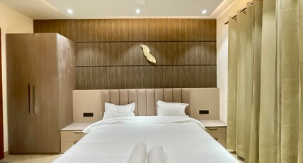 The Neeraj Marine Ganga Stays With Ganga Ghat Access Room Type - One BHK Ganga View with Sofa Bed