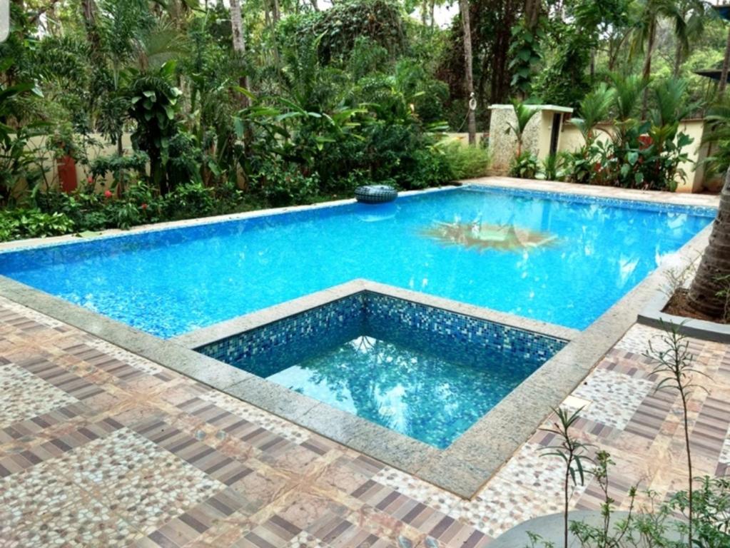 2 BHK Mango Apartment at Palolem Garden Estate - Tap to explore photos
