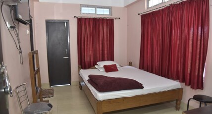 Bibha's Lodge near GNRC Hospital Room Type - Three bedded room with attached bath Bibha's Lodge near GNRC Hospital Room Type - Three bedded room with attached bath