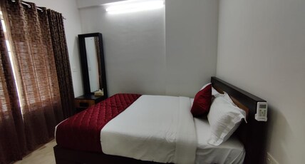 Nidhi Residency Room Type - Deluxe Room