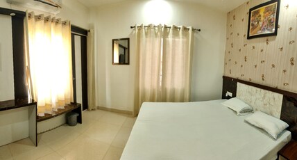 Surya Inn Homestay Room Type - Deluxe Room