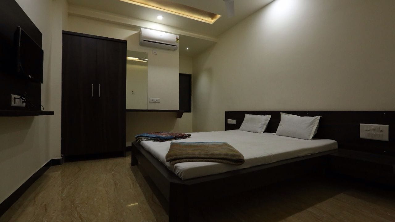 Hotel Asha - Tap to explore photos