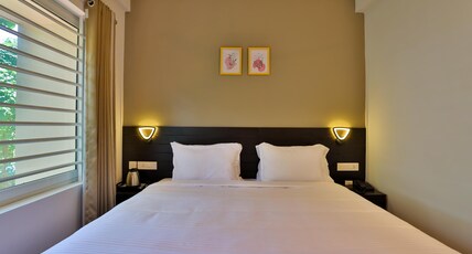 Ivy Residency Room Type - Deluxe Room AC