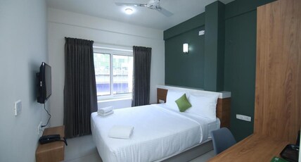 Hotel Royal Blooms Room Type - Premium Room