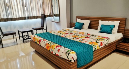 Hotel Dhruva, Solapur (Pet Friendly) Room Type - Deluxe AC Room (Queen Bed)