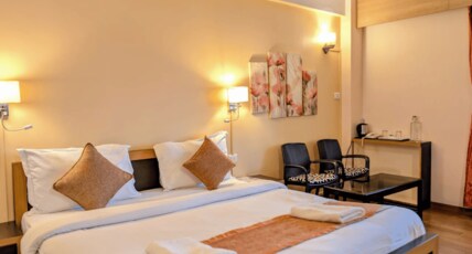 Orange Inn Stay | Rooms & Restaurant Room Type - Superior Executive Queen Room