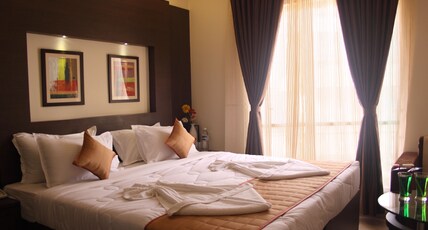 Pristine Residency Room Type - Deluxe Room With Airport Transfer