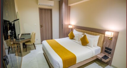 Hotel Surabhi Room Type - DELUXE KING ROOM Hotel Surabhi Room Type - DELUXE KING ROOM